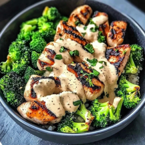Grilled chicken and broccoli bowl with creamy garlic sauce