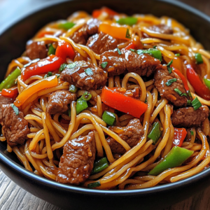 Savory Beef Stir-Fry Tossed with Vegetables & Slurp-Worthy Noodles close-up