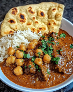 Slow-simmered coconut beef and chickpea curry with fresh cilantro