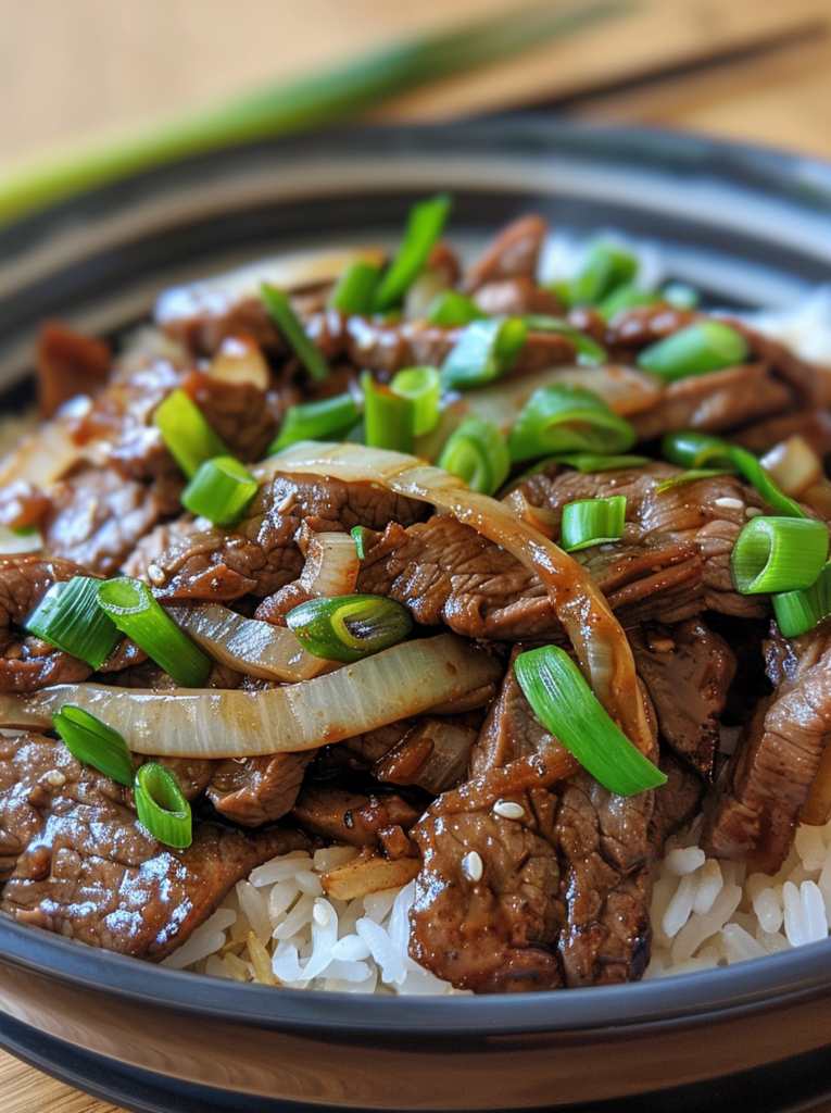 Savory beef stir-fry with sweet onions and aromatic sauce close-up