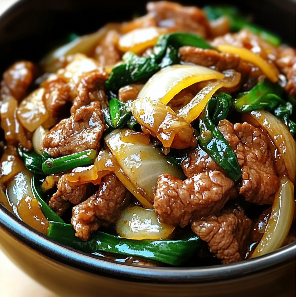 Takeout-style Chinese beef and sweet onion stir-fry with rice