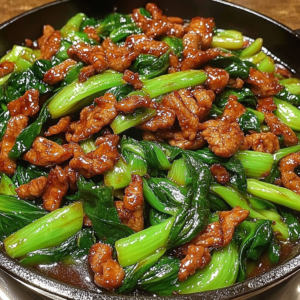 Savory Pork Stir-Fry with Crisp Bok Choy and Garlic-Ginger Sauce is a quick, healthy dinner ready in 30 minutes. Full of flavor and freshness.