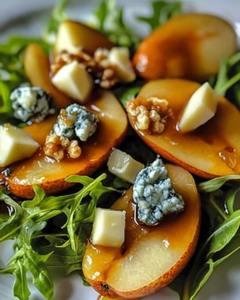 Caramelized Pear and Blue Cheese Salad on a white plate