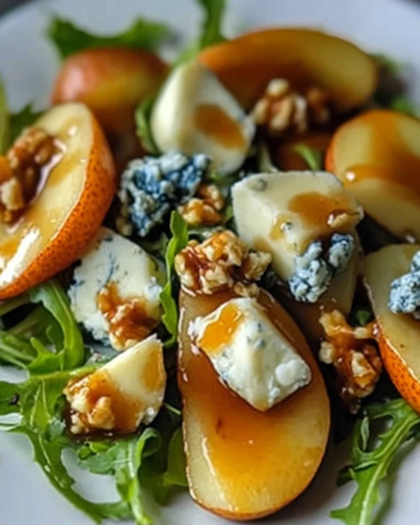 Caramelized Pear and Blue Cheese Salad on a white plate