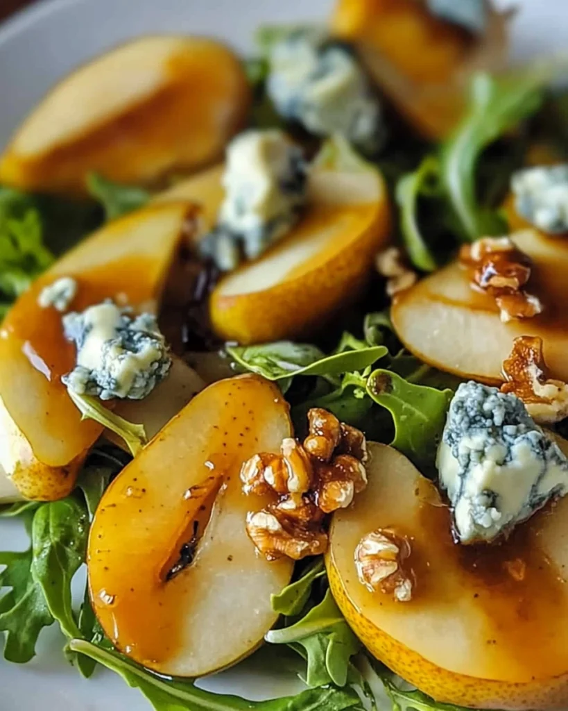 Caramelized Pear and Blue Cheese Salad on a white plate