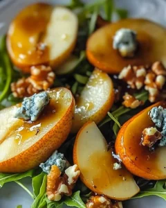 Caramelized Pear and Blue Cheese Salad on a white plate